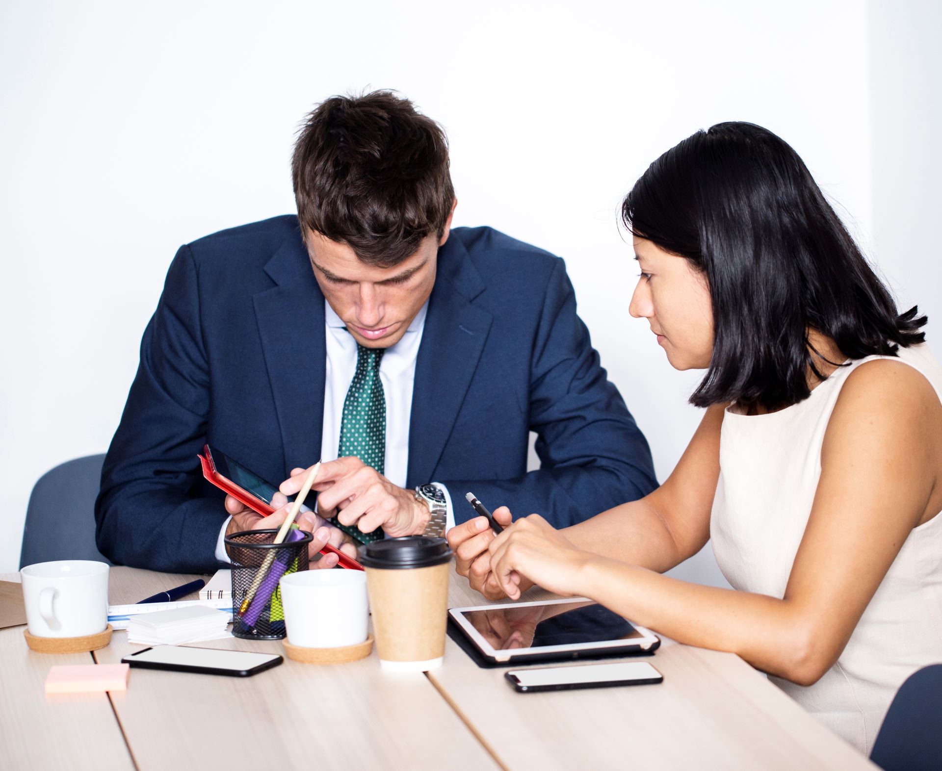 high-angle-coworkers-working-together